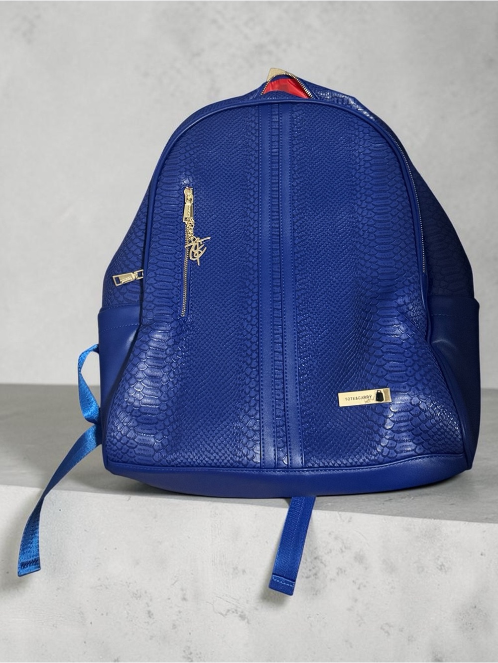 Textured Blue Women’s Backpack with Gold Accents